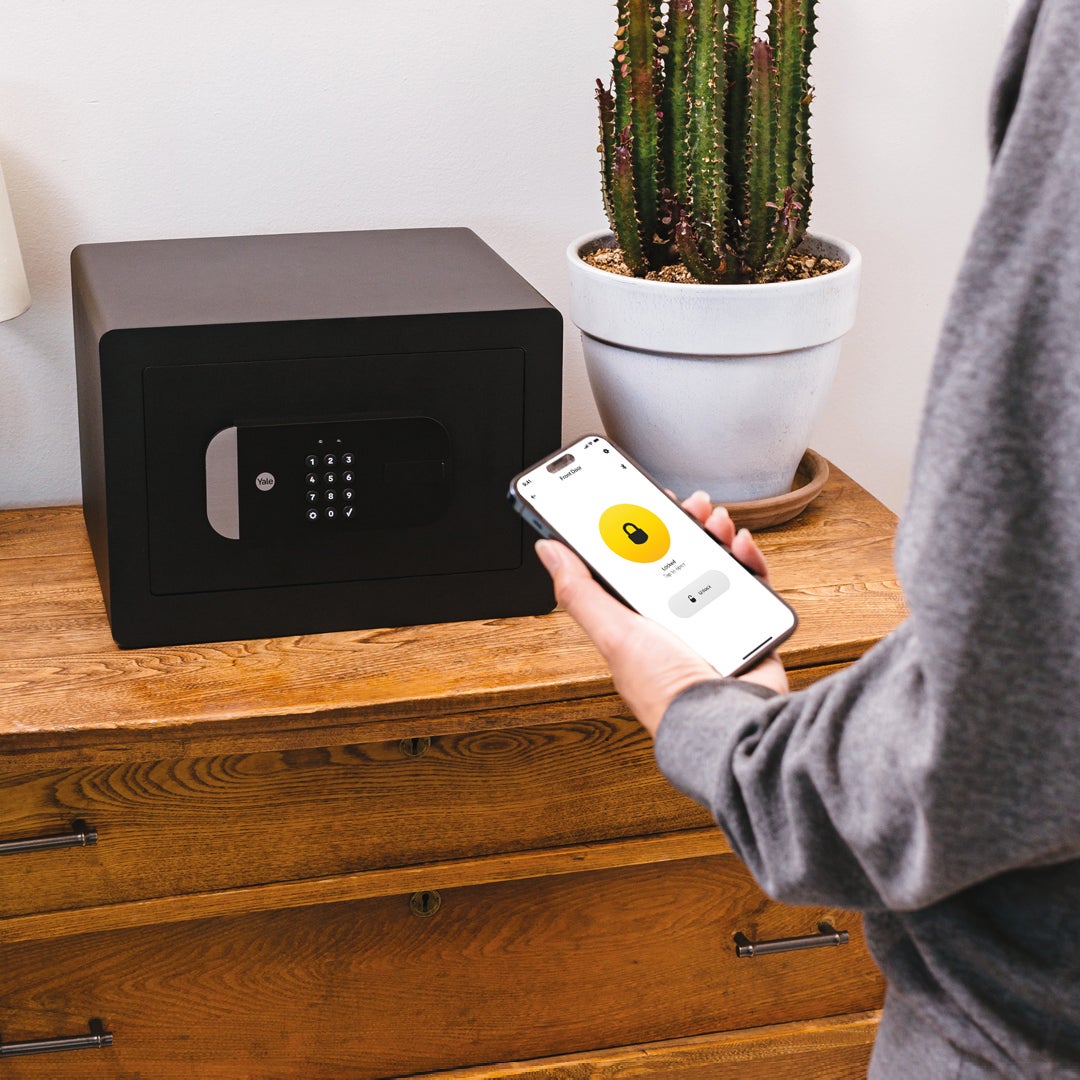 Yale Smart Safe protecting valuables like work gear, cameras, money, jewelry, and private documents for secure storage in the modern home.