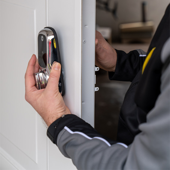 A Professional Yale installer, installing the Yale Keyless Connected Smart Lock