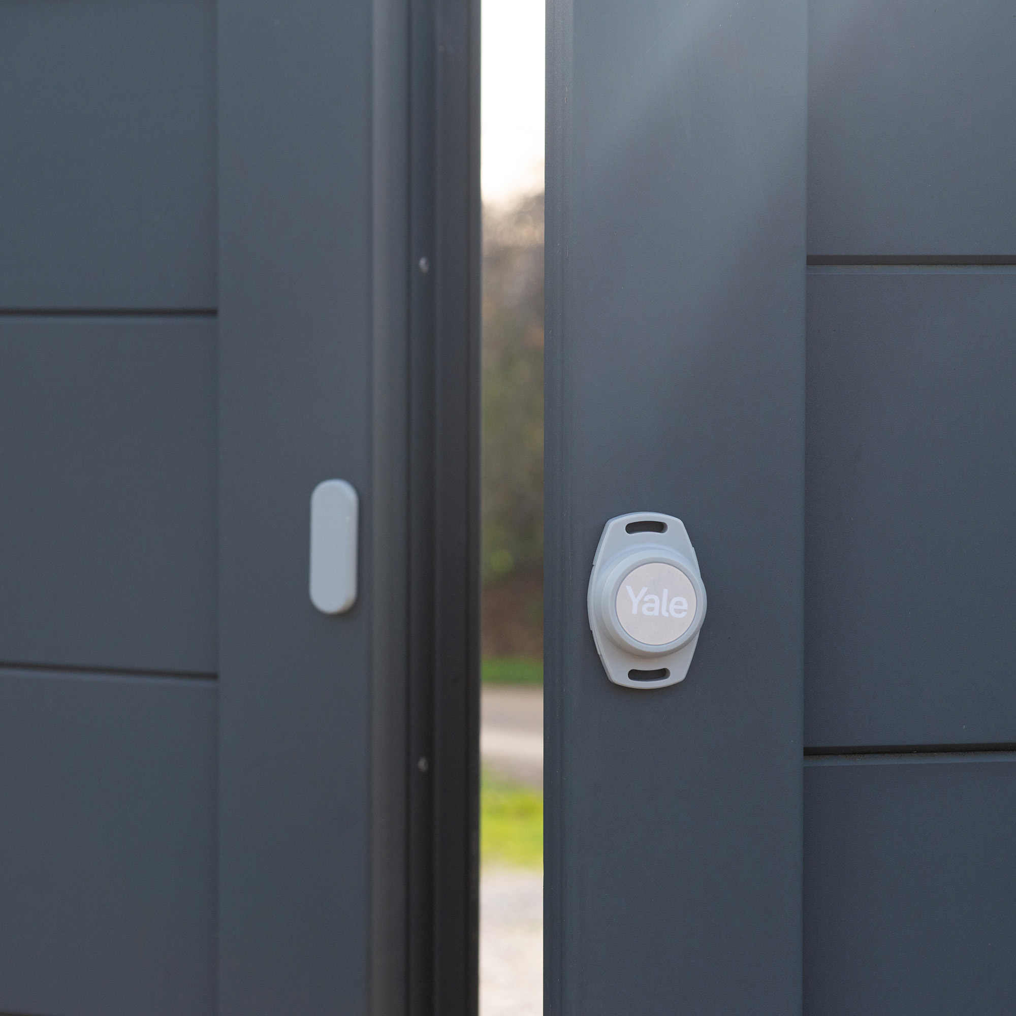 ale Smart Openers controlling access to garages or gates, with automatic opening on approach or via voice assistant commands.