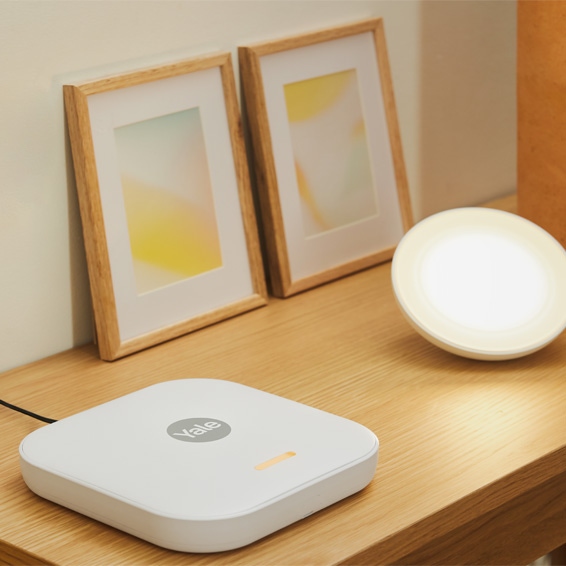 Yale Smart Alarm Hub on a side table