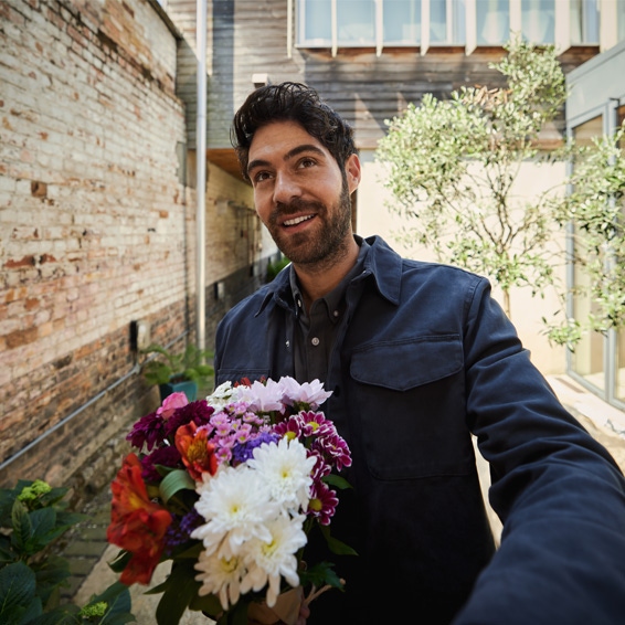 Yale Smart Video Doorbell footage showing someone at the front door with a bouquet of flowers